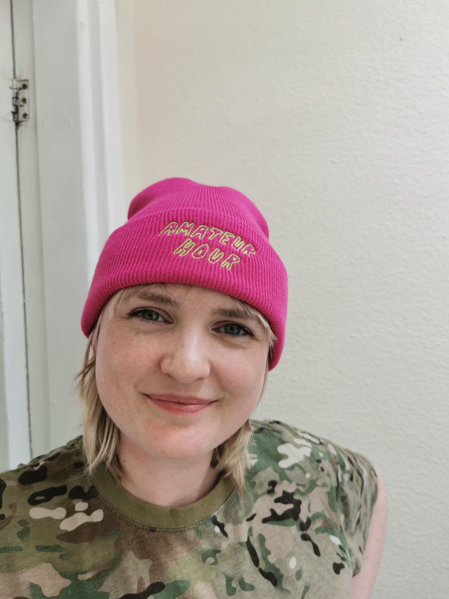 AMATEUR HOUR FUSCIA BEANIE EMBROIDERED WITH AMATEUR HOUR TEXT IN GREEN