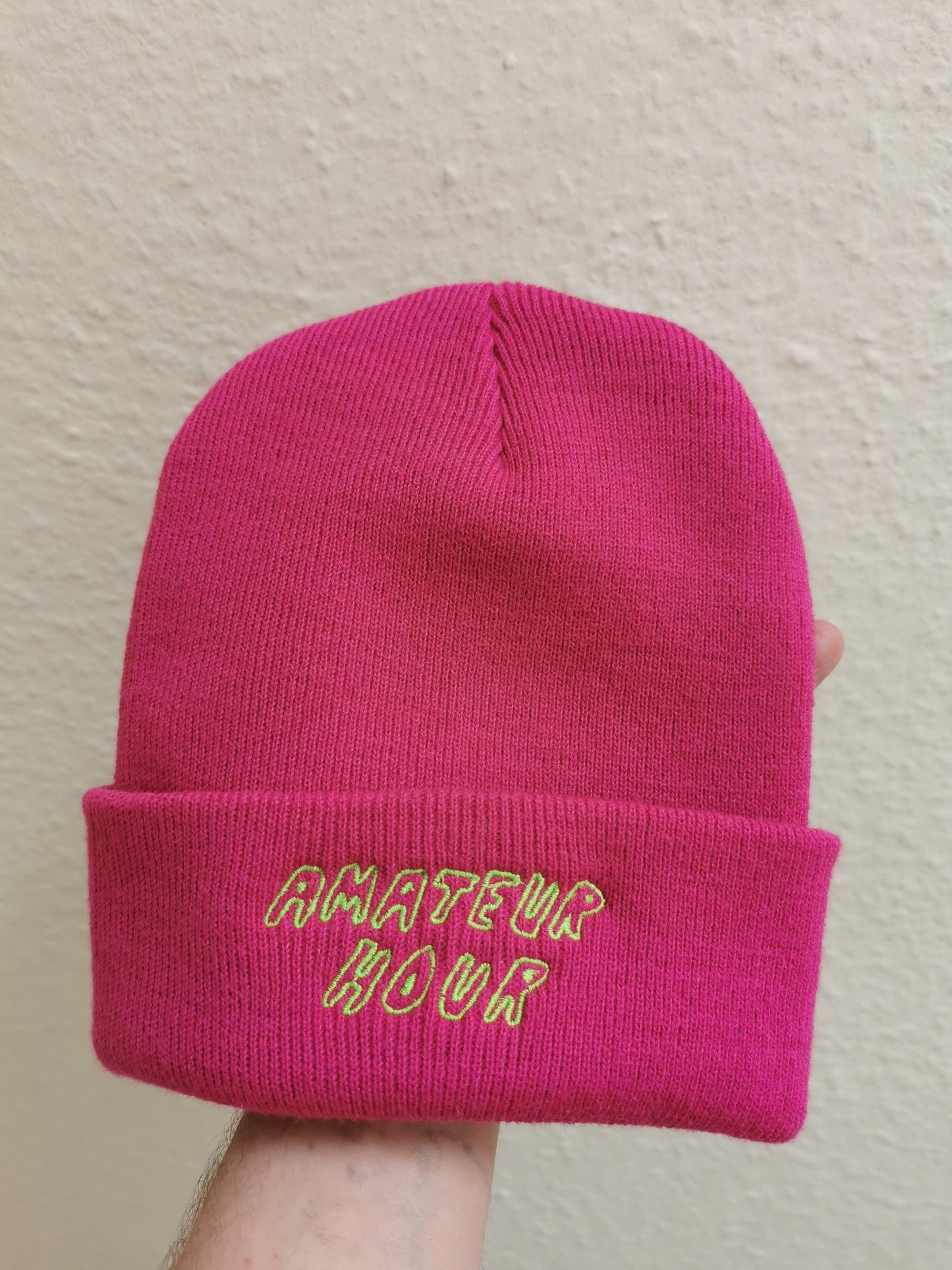 AMATEUR HOUR FUSCIA BEANIE EMBROIDERED WITH AMATEUR HOUR TEXT IN GREEN