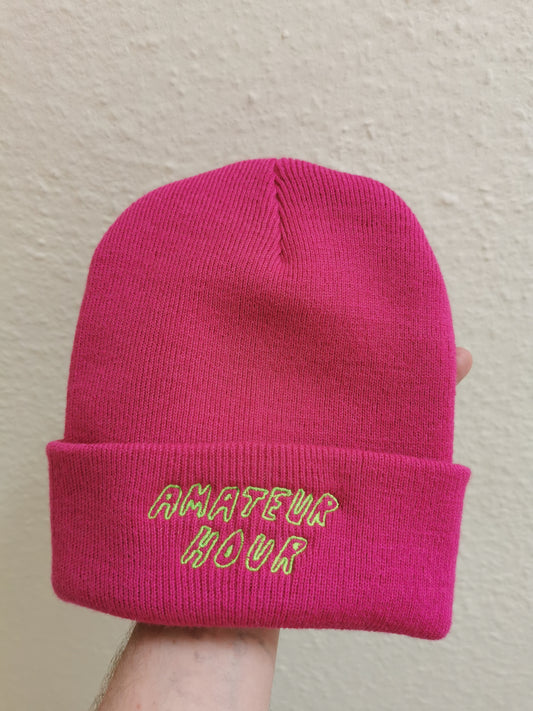 AMATEUR HOUR FUSCIA BEANIE EMBROIDERED WITH AMATEUR HOUR TEXT IN GREEN